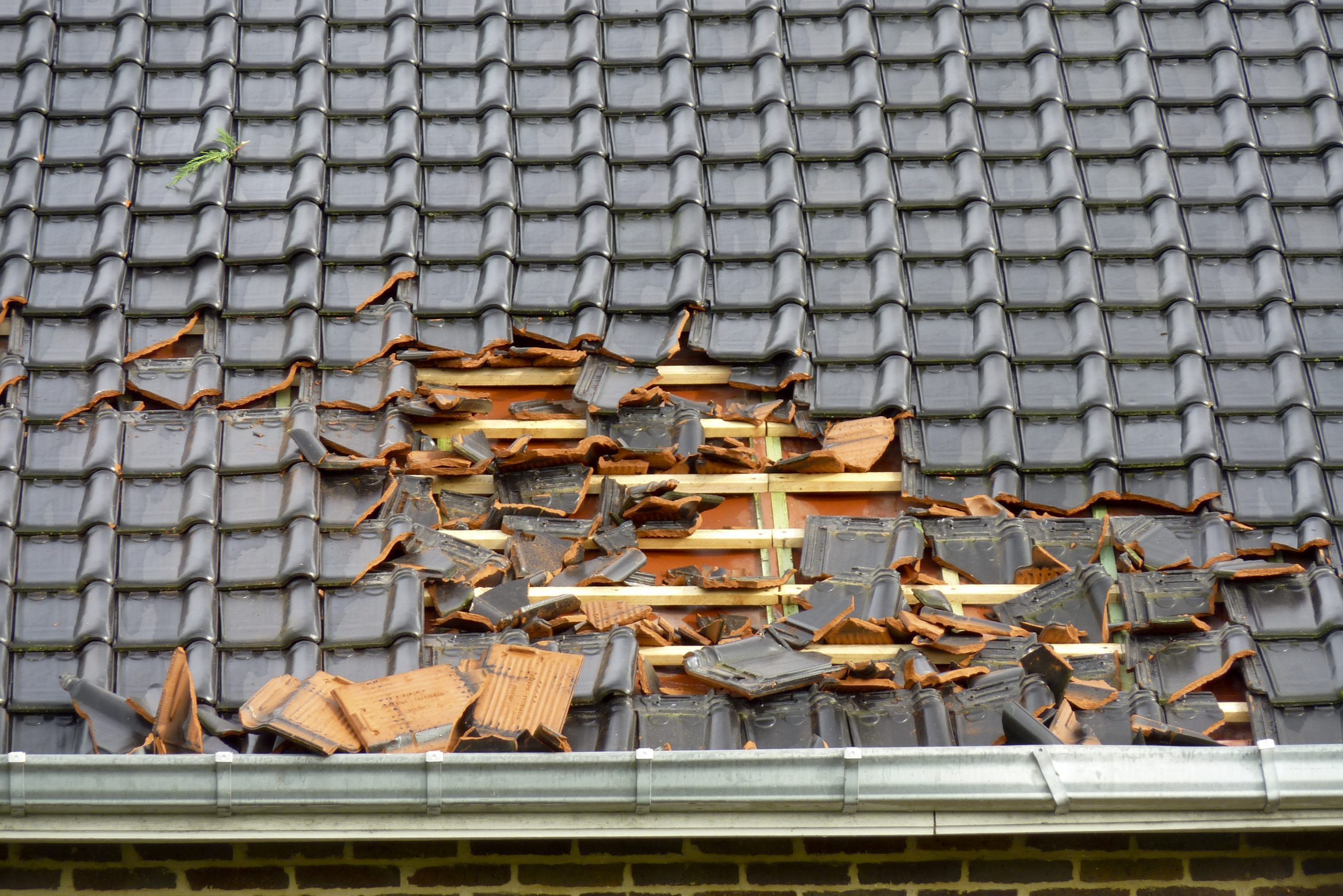 storm damage tile roofing